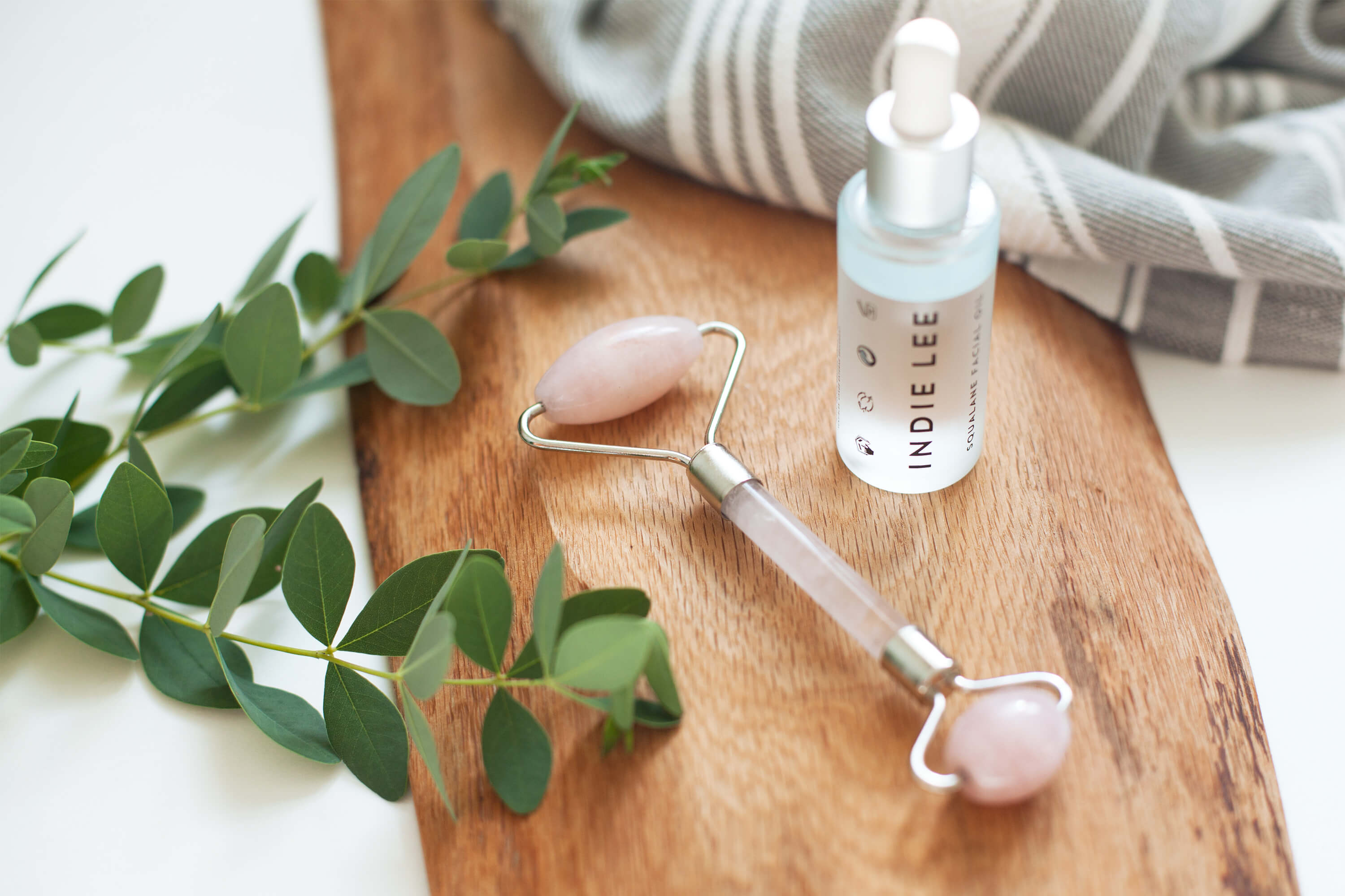 skin gym rose quartz roller and indie lee squalane oil
