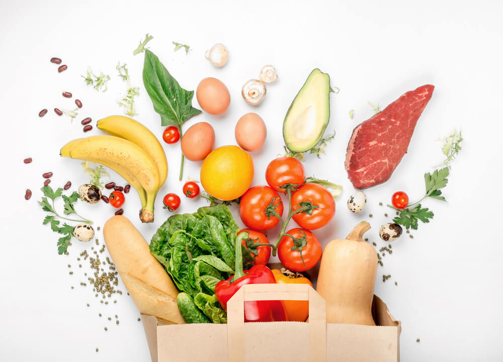 Image of grocery bag full of colourful food