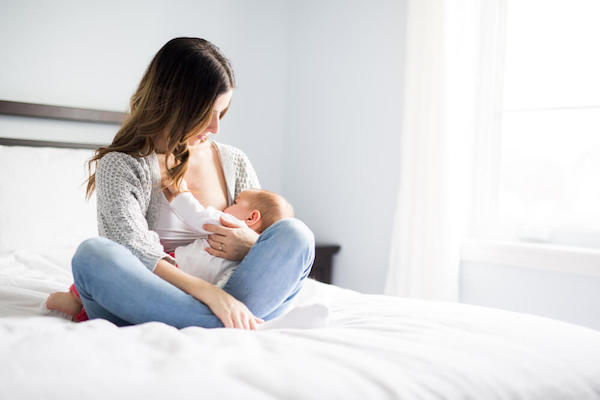 Woman breastfeeding her child