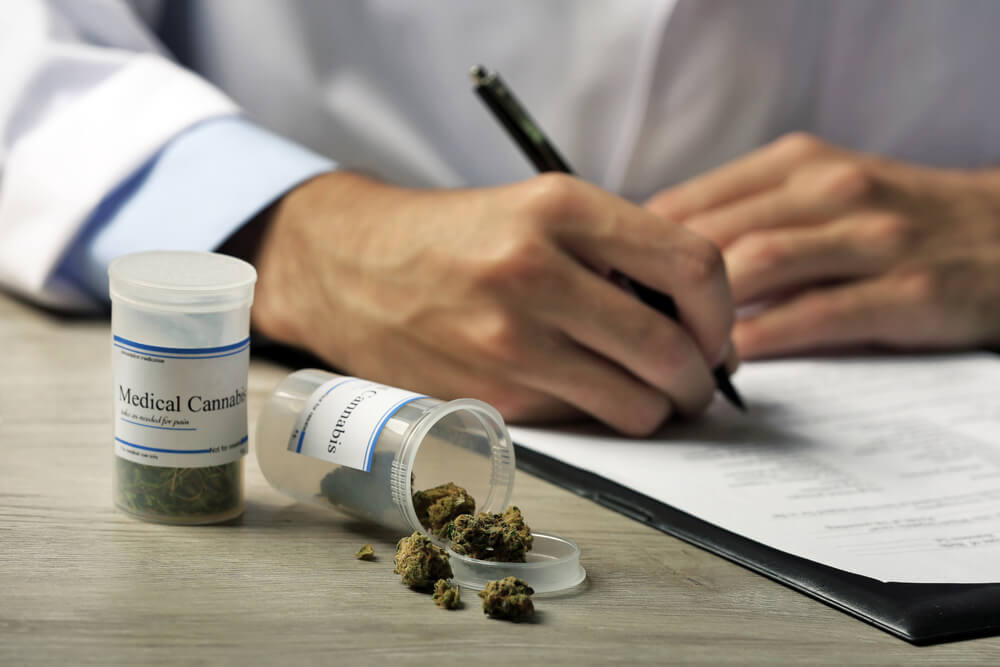 2 prescription bottles filled with cannabis