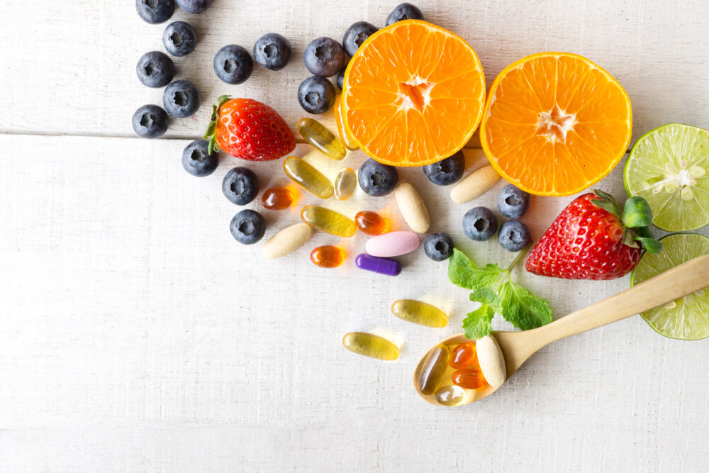 Fresh fruits and supplement capsules