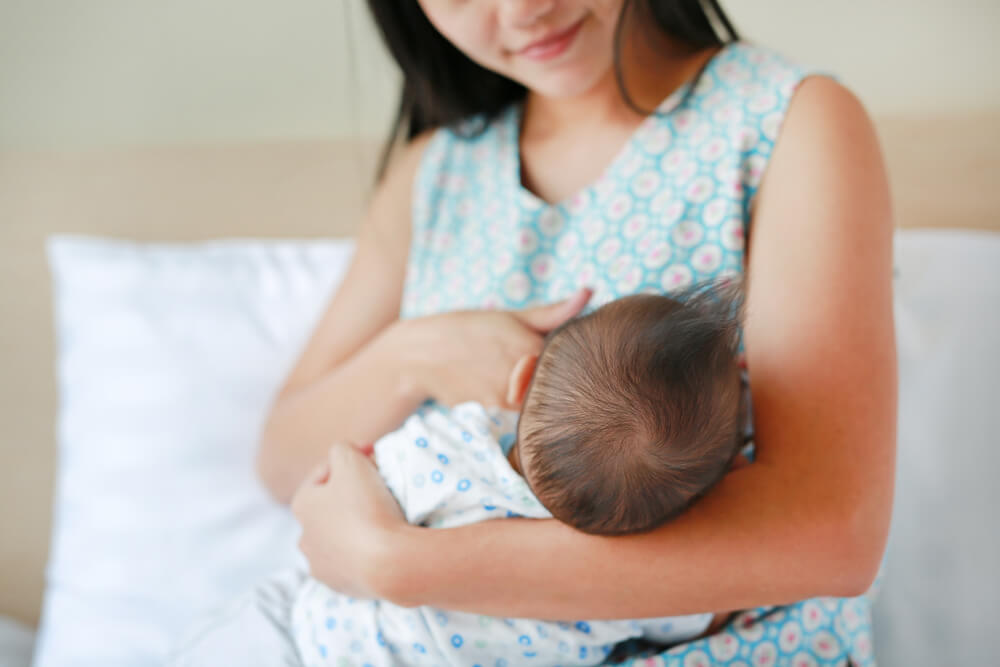 mother breastfeeding baby