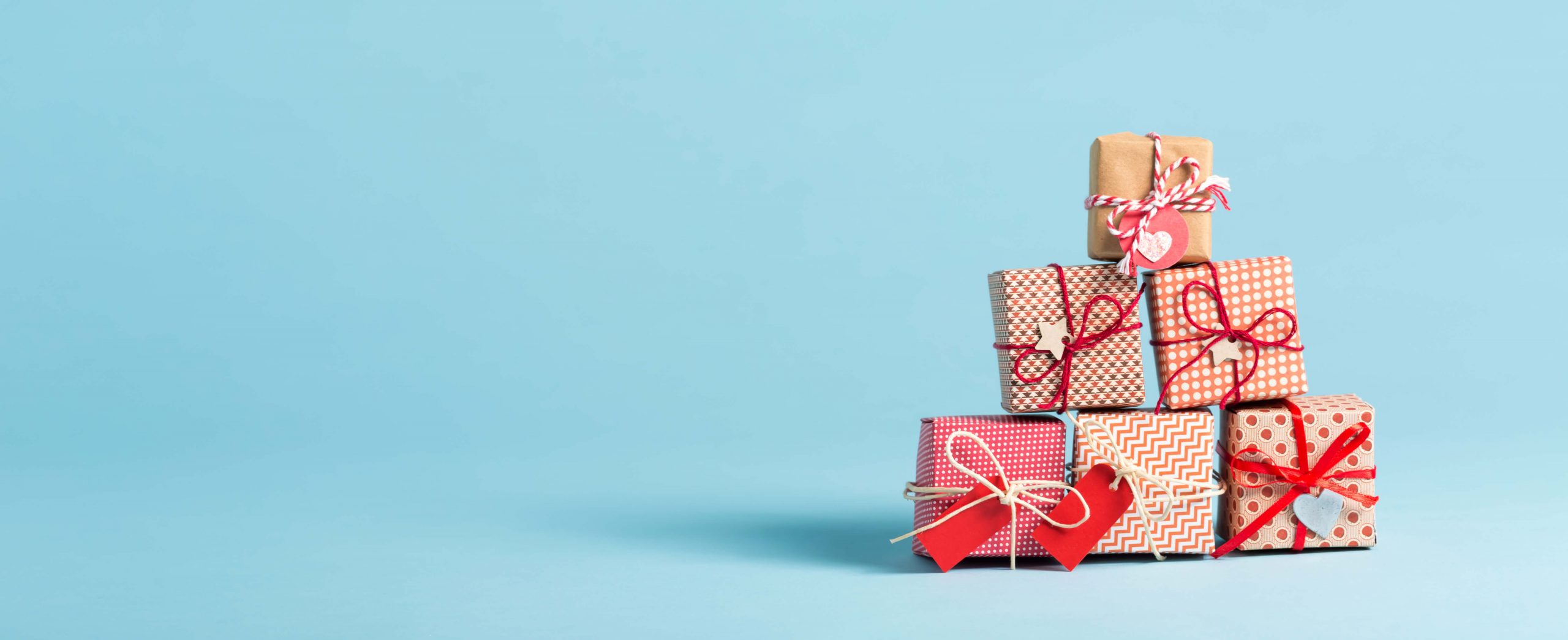 holiday gift stacked on blue background