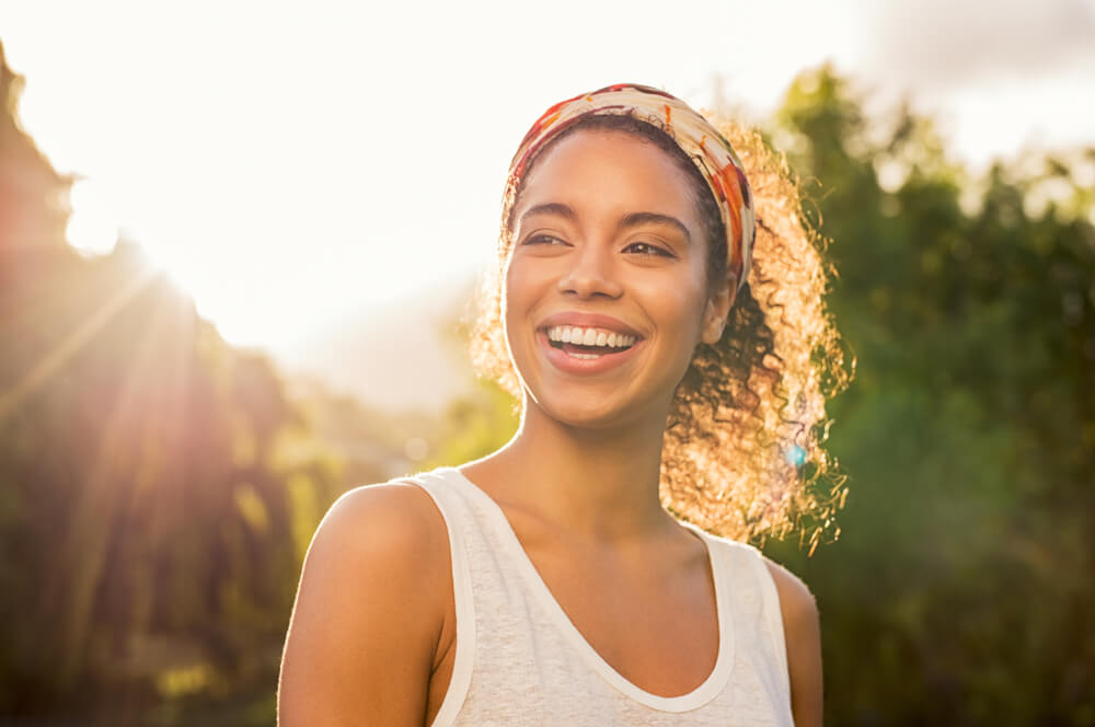 woman smiling on a sunny day