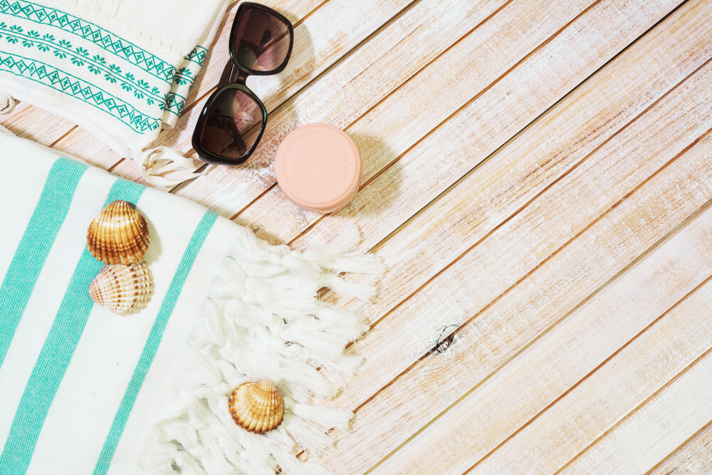 beach essentials on a dock