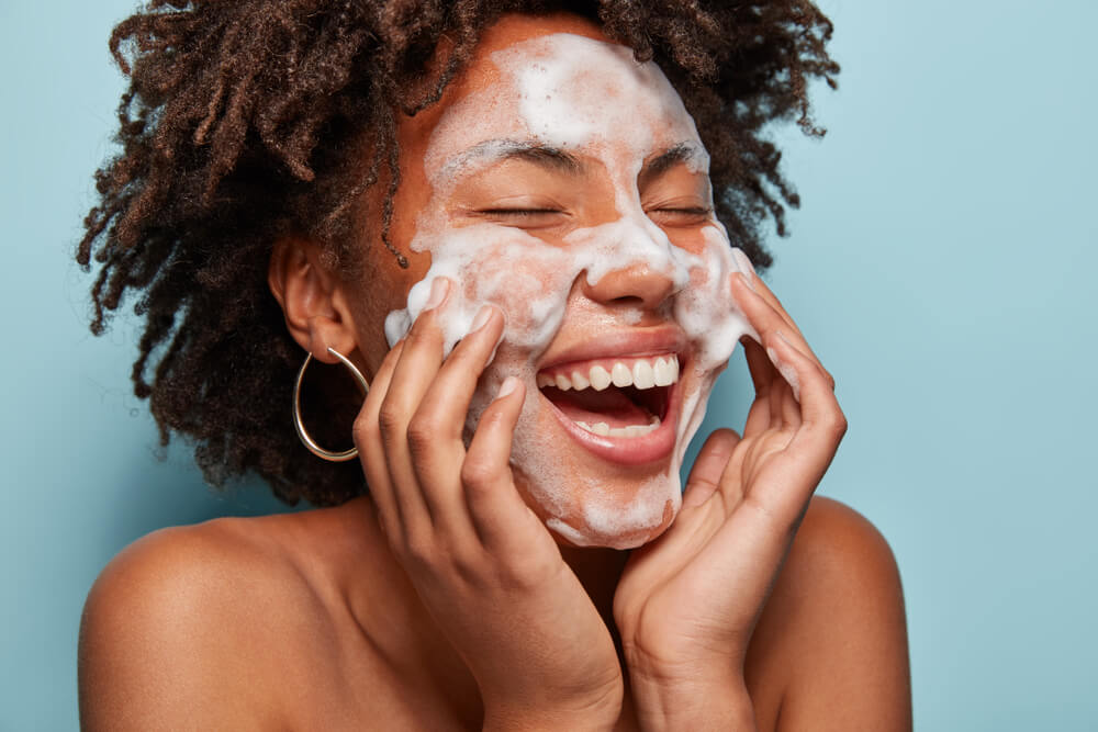 woman washing face