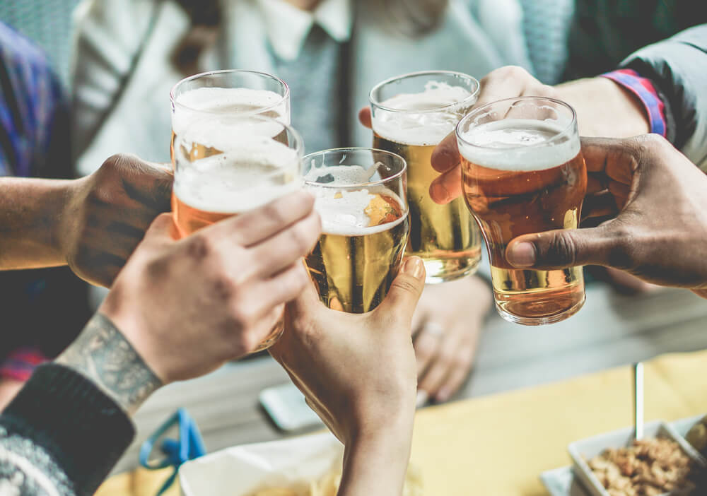 group of people raising a toast