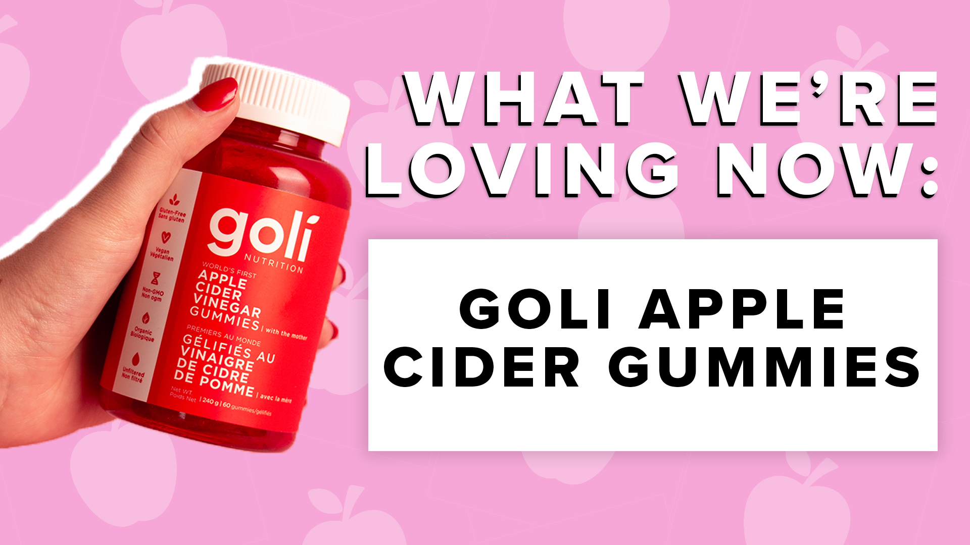 Pink Background with hand holiding Goli Gummies