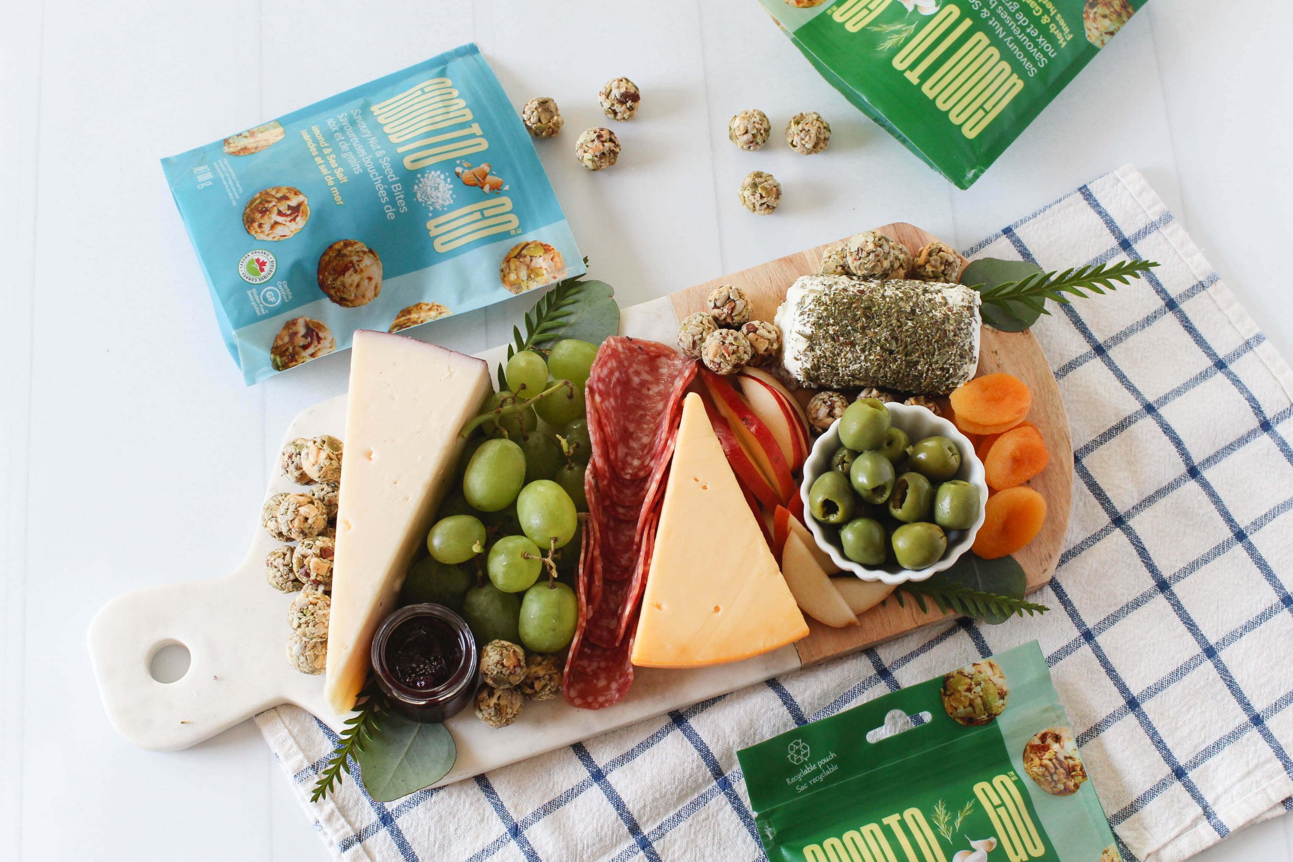 Overhead shot of a snack board feature new GOOD TO GO Savory bites