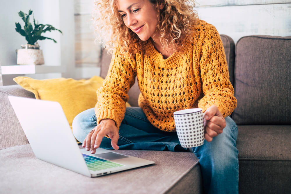 Woman Working from her couch